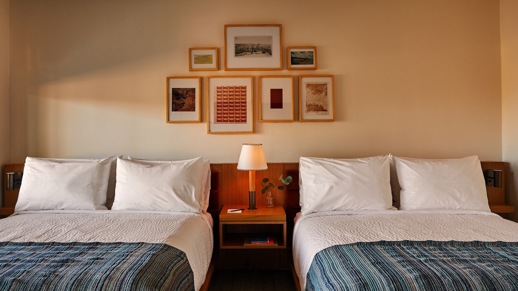 two queen headboards and artwork