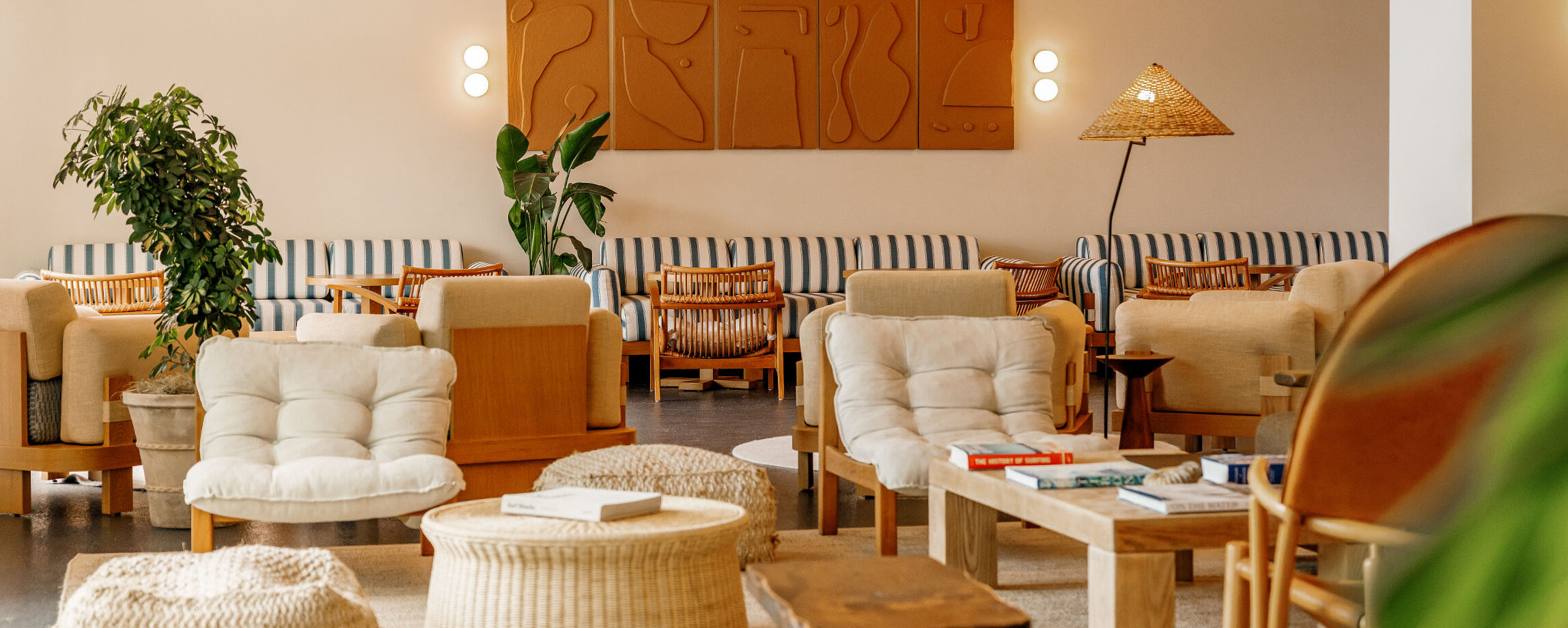 Lobby lounge area with warm tones and ample seating