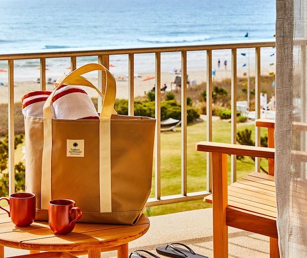 Bag with surf and sound logo in a table